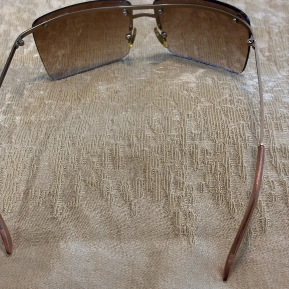 Brown Rimless Sunglasses Louis Vuitton- price represents age Brown Rimless Sunglasses Louis Vuitton- price represents age main image 3